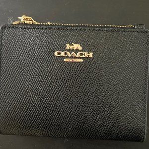 Small black leather Coach wallet
